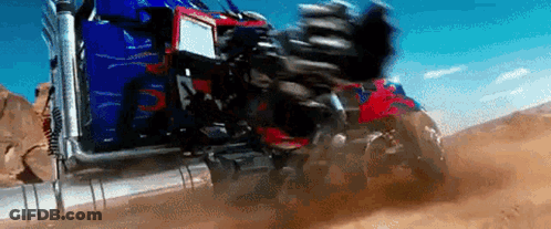 Transformer Driving Down Dirt Road With Motorcycle GIF