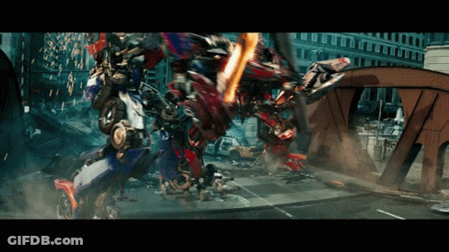 Transformer Fighting Another Transformer In City GIF