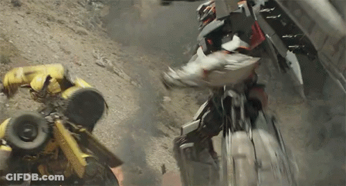 Transformer Fighting Another Transformer On Hill GIF