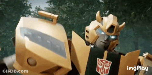 Transformer Robot With Blue Eyes Holding Shield GIF