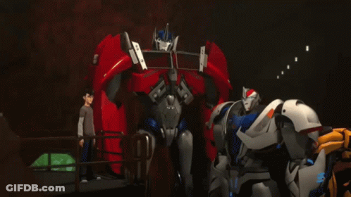 Transformers Standing In Dark Room GIF