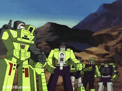 Transformers Standing Together With Letter C GIF