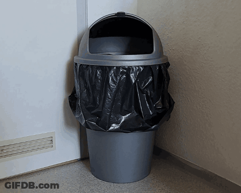 Trash Cans Sitting In Rain On Side Of Road GIF