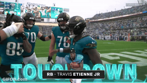 Travis Etienne Jr. Holding Football GIF