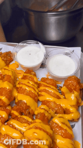 Tray Of Chicken Wings With Cheese And Ranch GIF