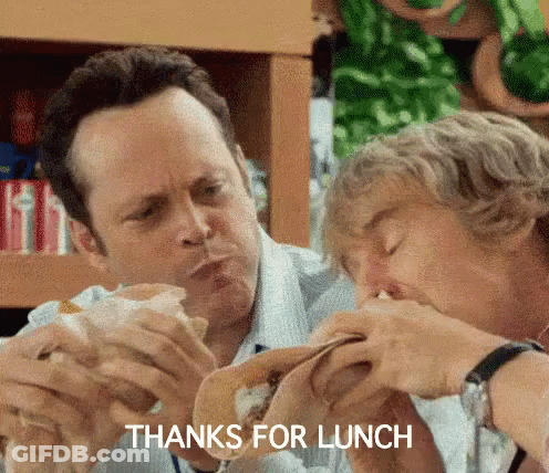 Tray Of Food Beside Notebook And Pen GIF