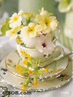 Tree With Arms And Legs Surrounded By Flowers Saying I Love Trees GIF