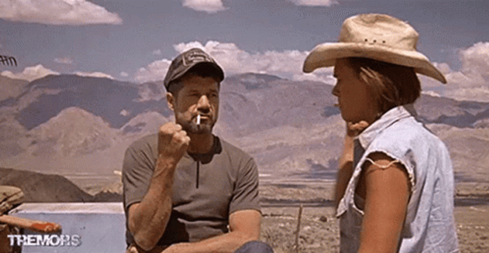 Tremors Earl And Valentine Playing Rock Paper Scissors GIF