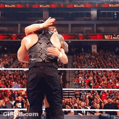 Tribal Chief Roman Reign Hugs Enemy Wwe Fight GIF