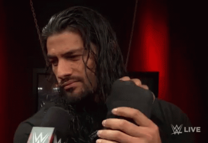 Tribal Chief Roman Reign Wearing Gloves GIF
