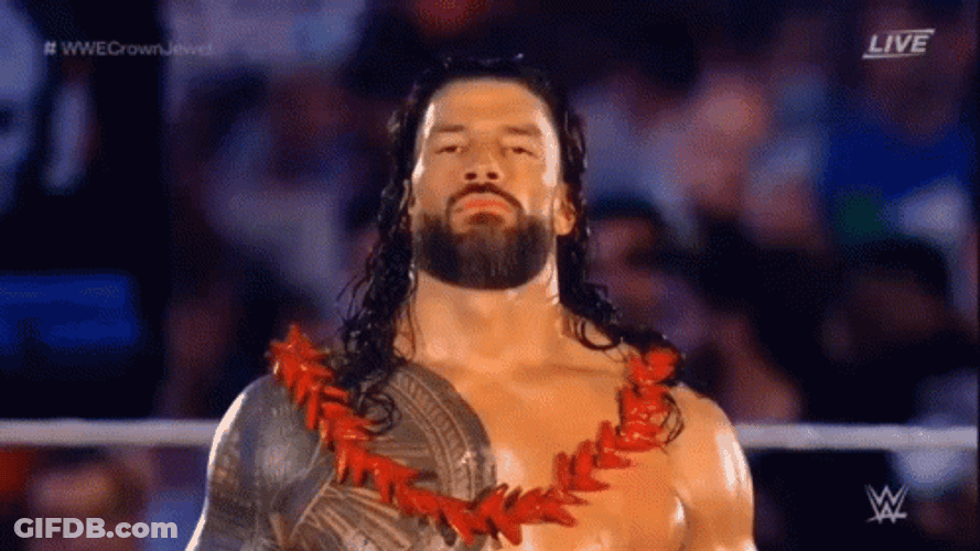 Tribal Chief Roman Reign Wins Wwe Holding Two Belt GIF