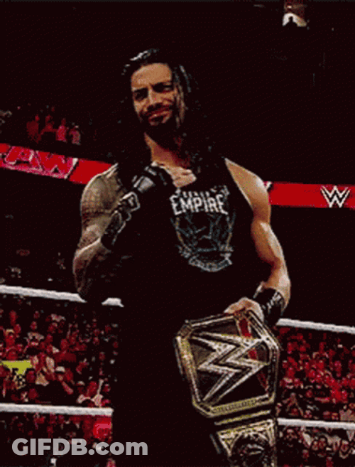 Tribal Chief Roman Reigns Making Get Out Hand Sign GIF