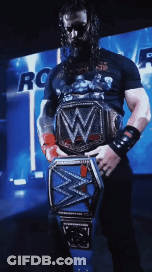 Tribal Chief Roman Reigns Wins Wwe Holding Belt GIF