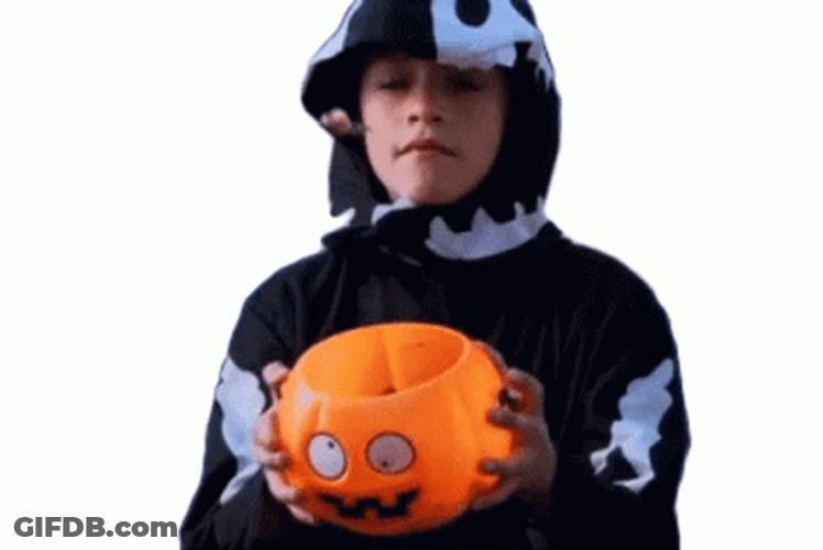Trick Or Treat Candies Getting Thrown At A Kid GIF