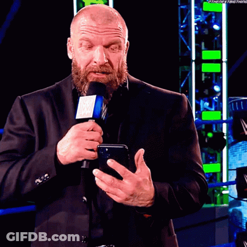 Triple H Reading Text Disappointed Reaction GIF