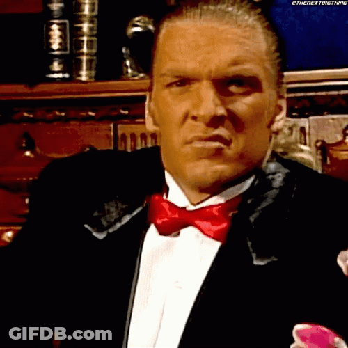 Triple H Shrug Passive Reaction GIF