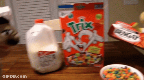 Trix Cereal Box Next To Gallon Of Milk GIF