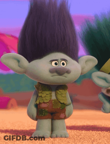 Troll With Purple Hair And Green Vest GIF