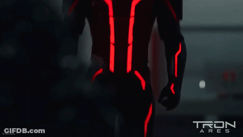 Tron Ares Poster With Man In Black Suit GIF