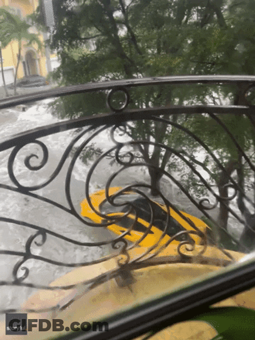 Tropical Storm Car Submerged In Flood GIF