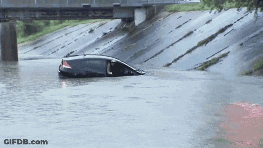 Tropical Storm Vehicle Engulfed By Flood GIF