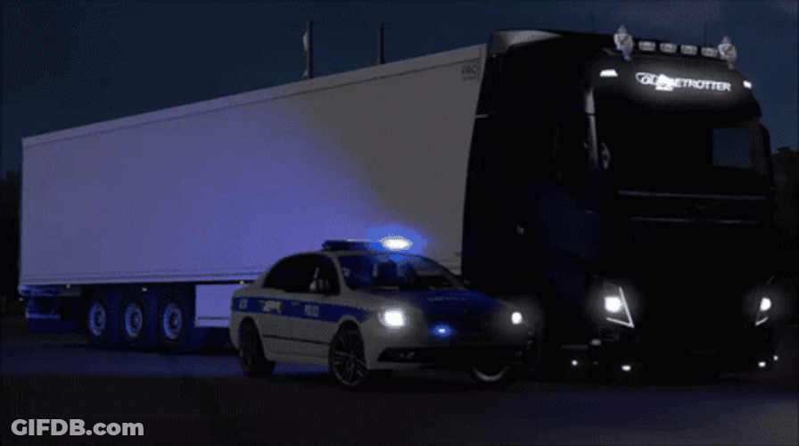 Truck Beside Police Car With Blue Lights GIF