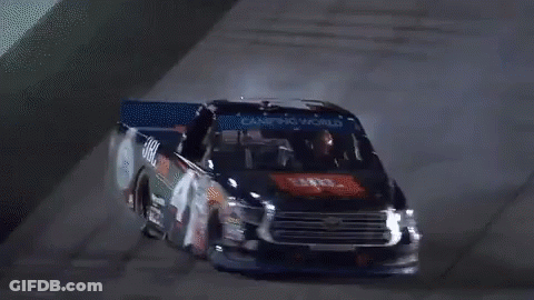 Truck Drifting On Track With Tire Smoke GIF