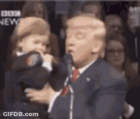 Trump Holding A Child On Inauguration Day GIF