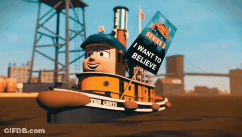 Tugboat Holding Sign Saying I Want To Believe GIF