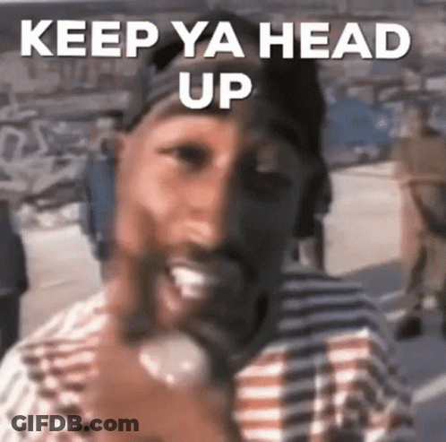 Tupac Shakur Funny Face Talking On Cell Phone With Headphones GIF