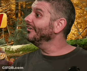 Turkey Holding Knife And Fork Saying Give Thanks GIF