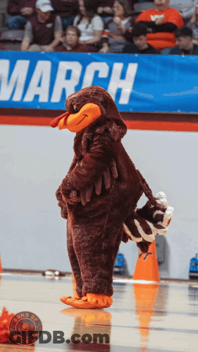 Turkey Mascot In Front Of March Banner GIF