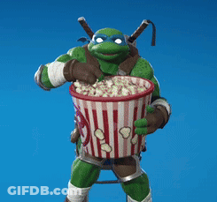Turtle Holding Striped Bucket Of Popcorn GIF