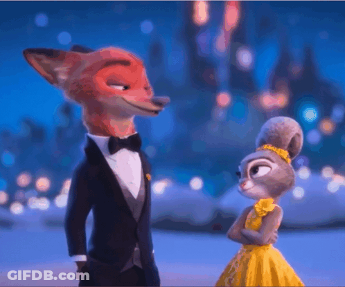 Tuxedo Man And Yellow Dress Woman Staring GIF