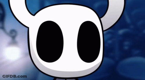 Tuxedo Man With Bow Tie Looking At Camera GIF