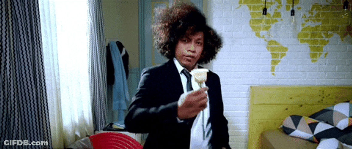 Tuxedo Offering Flower GIF