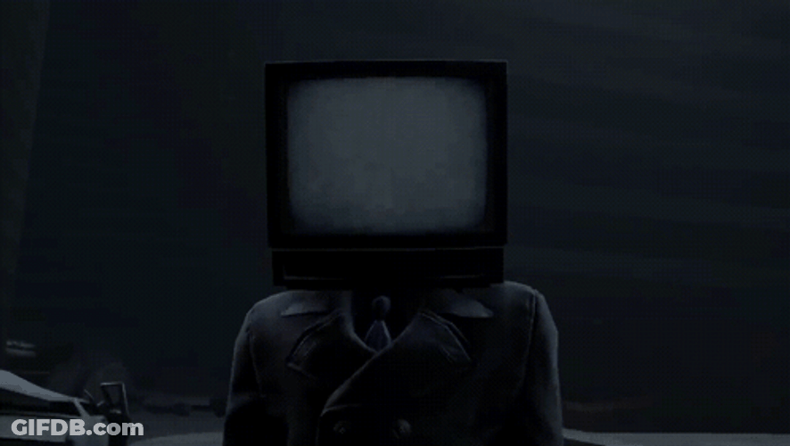 Tv Man Smiley Face Standing In The Dark GIF