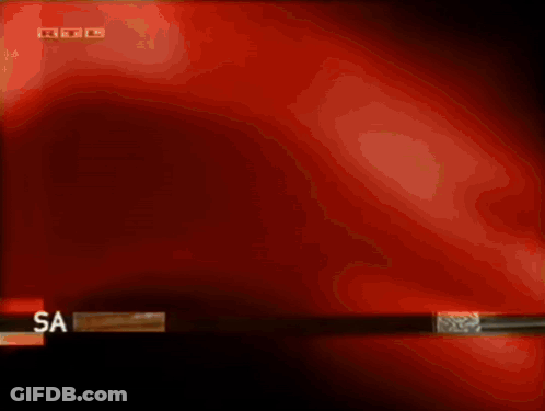 TV Screen Showing Feet On Briefcase With USA GIF