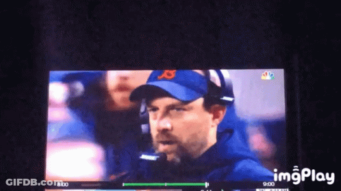 TV Screen Showing Man In Hat With Letter J GIF