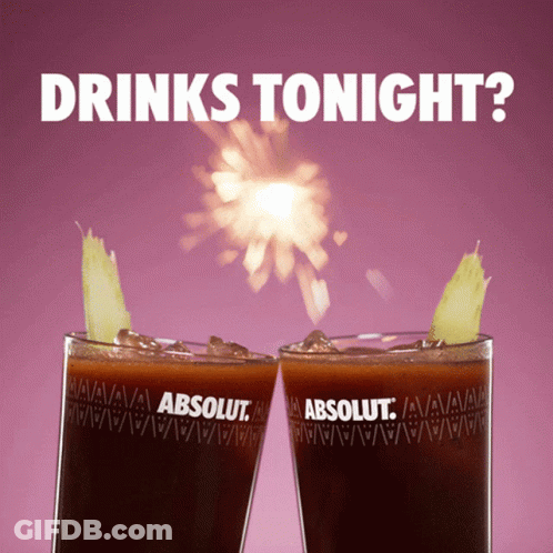 Two Absolut Vodka Glasses With Fireworks GIF