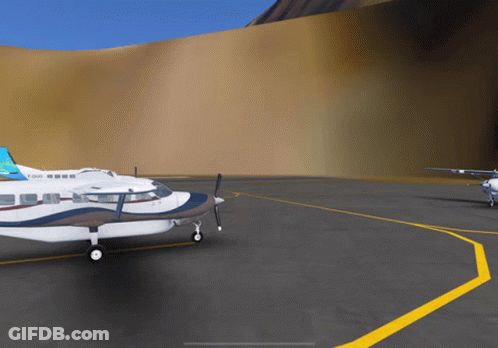 Two Airplanes Parked On Runway GIF