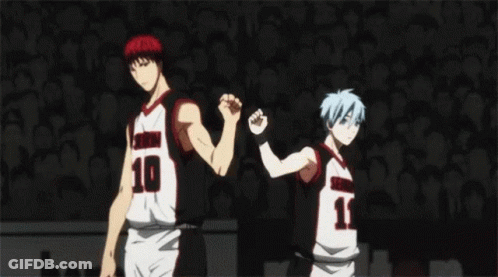 Two Anime Basketball Players Are Standing Next To Each Other On A Court . GIF