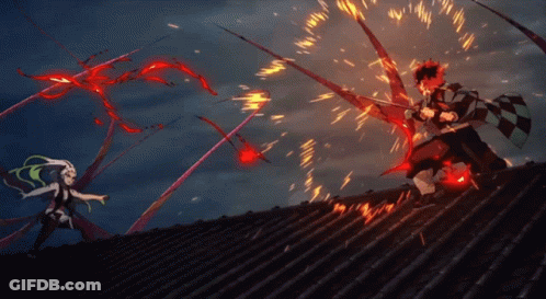 Two Anime Characters Are Fighting On A Roof With Fire Coming Out Of Their Weapons GIF
