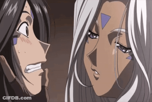 Two Anime Characters Are Looking At Each Other And One Has A Triangle On Her Face GIF