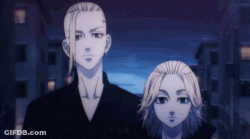 Two Anime Characters Are Standing Next To Each Other In A City GIF