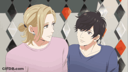 Two Anime Characters Looking At Each Other With Diamond Pattern GIF