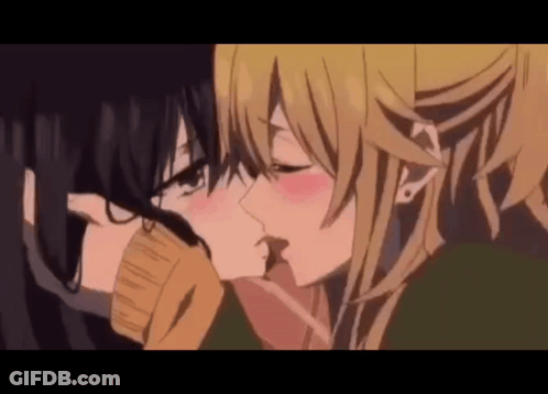 Two Anime Girls Are Kissing Each Other In A Close Up . GIF