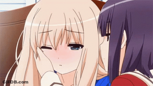 Two Anime Girls Are Kissing Each Other On The Cheek GIF