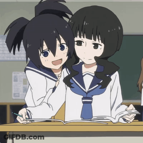 Two Anime Girls Are Sitting At A Desk With A Book GIF