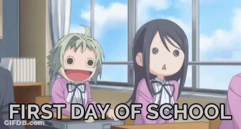 Two Anime Girls Are Sitting At Desks In A Classroom With The Words `` First Day Of School '' . GIF